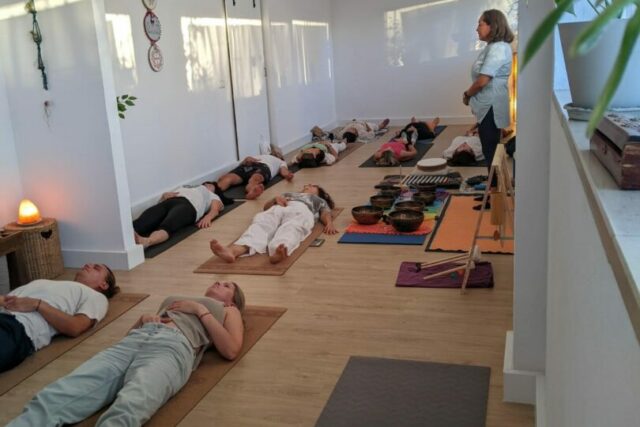 clau yoga teacher coworking class